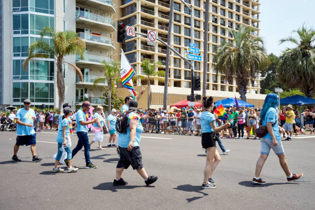 colorful Parade participants and spectators supporting the LGBT community stock photo