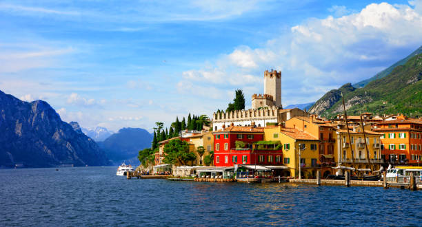 Beautiful scenic Lago di Garda - view of Malcesine village. Italy Travel and landmarks of Italy . Scenic lake Lago di Garda lake garda photos stock pictures, royalty-free photos & images
