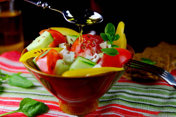 istock vegetarian salad with olive oil 824024104
