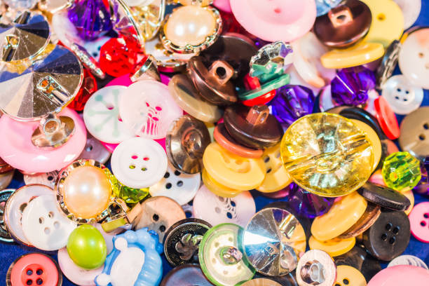 istock Close up of Old and New Buttons 824024382