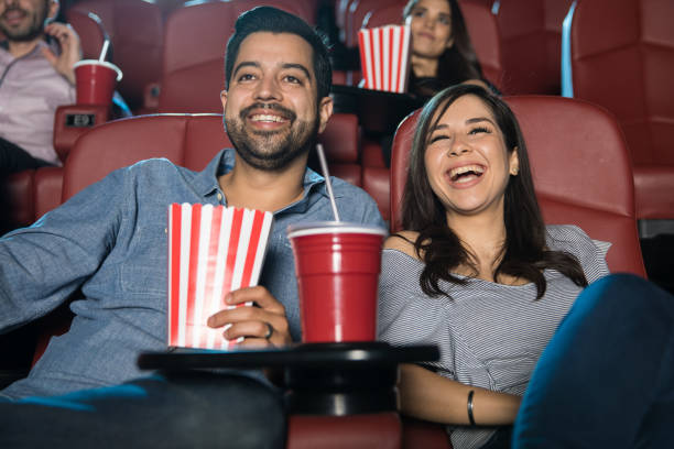istock Couple watching comedy at the theater 824029768