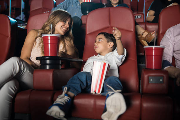 Hispanic boy excited about a movie