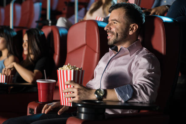 istock Happy guy watching a movie 824039706
