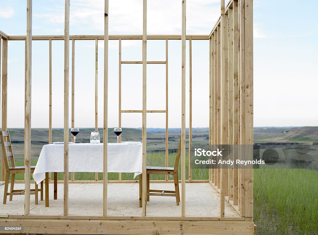 dinner table in framed house  Absence Stock Photo
