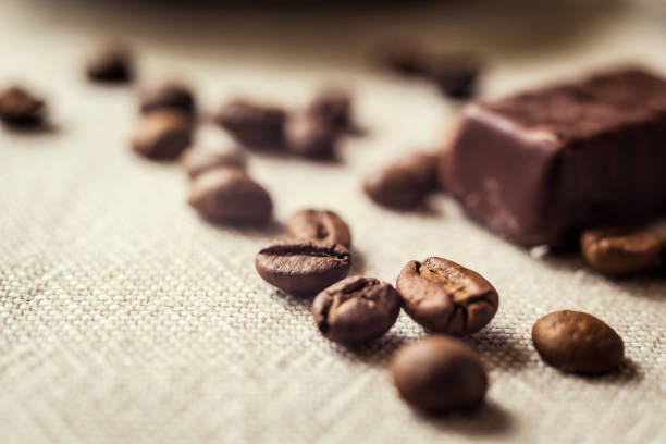 coffee beans and candy cane.spilled coffee beans