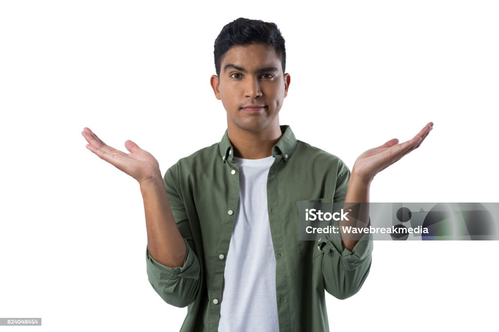 Frowning man gesturing against white background Portrait of frowning man gesturing against white background 80-89 Years Stock Photo