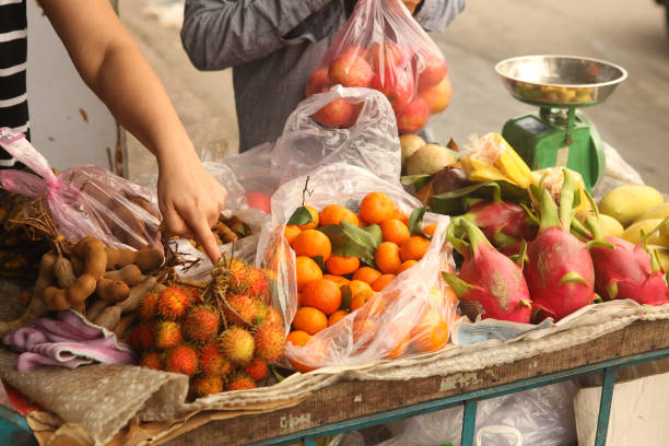 istock tangerin dragon fruit rambutan mango fruit on market 824048704