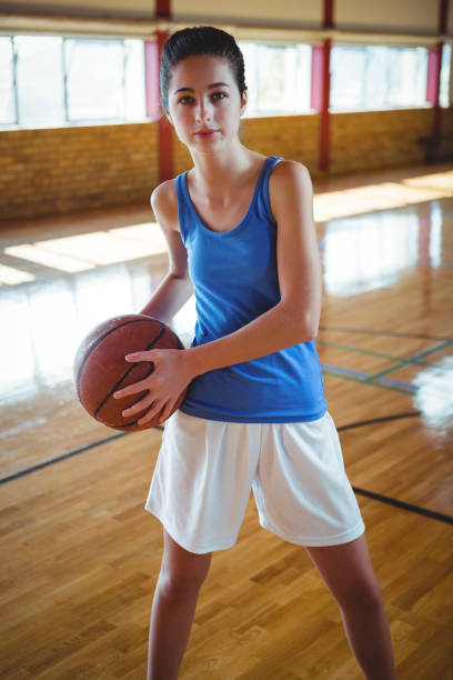 istock Portrait young woman with basketballl 824069154