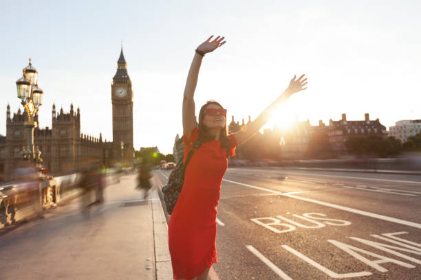 istock Woman having fun at sunset 824085796
