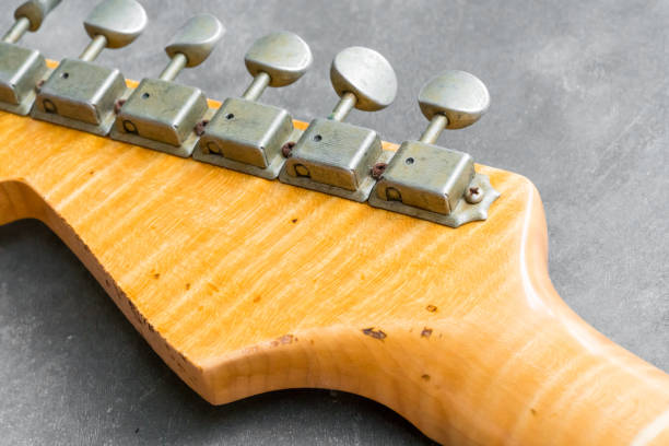 istock closeup of flame maple guitar headstock 824087162