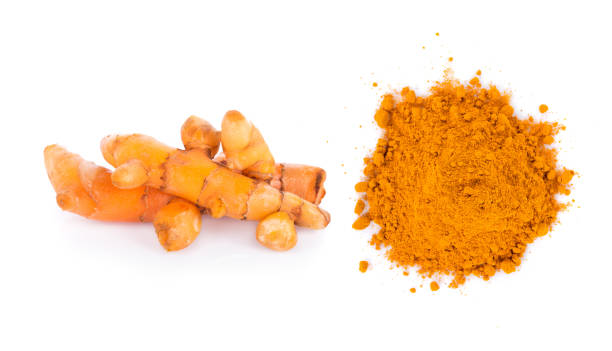 istock turmeric powder on white background. top view 824089766