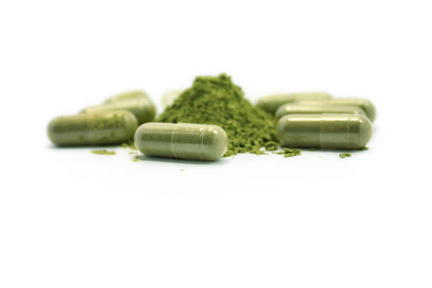 istock Close up andrographis paniculata herbal antipyretic capsules isolated on white 824091206
