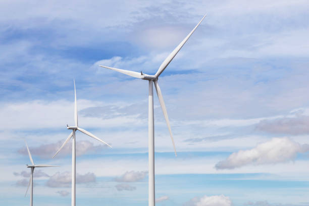 istock white wind turbines generating electricity in wind power station 824093868