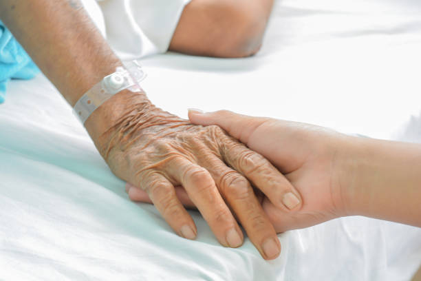 istock old  hand women on  bed 824097206