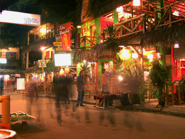 Montanita Mountaineer Ecuador Montañita Montanita, Santa Elena, Ecuador - October 18, 2008: A lot of people walking on the principal street at Montañita Montanita Beach on saturday night. montanita ecuador stock pictures, royalty-free photos & images
