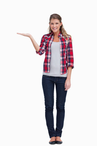 istock Portrait of a woman displaying a copy space 824102406