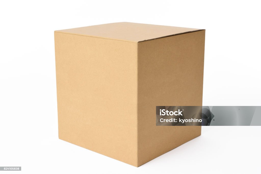 Isolated shot of blank cube cardboard box on white background Closed blank cube cardboard box isolated on white background with clipping path. Cardboard Box Stock Photo