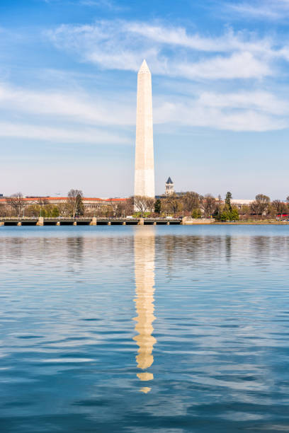 istock Tidal Basin with Washington Monument reflection and Old Post Office building 824108514