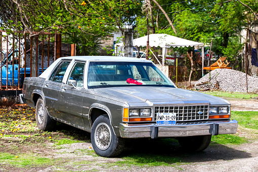 Guerrero, Mexico - June 1, 2017: Motor car Ford LTD Crown Victoria at the countryside.