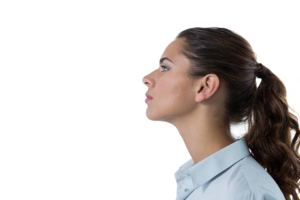 istock Female executive standing against white background 824126156