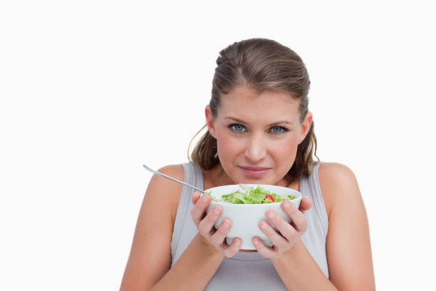 istock Quiet woman smelling a salad 824126738