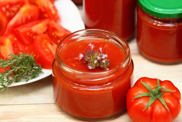 istock Making homemade tomato  ketchup with  oregano spice 824132344
