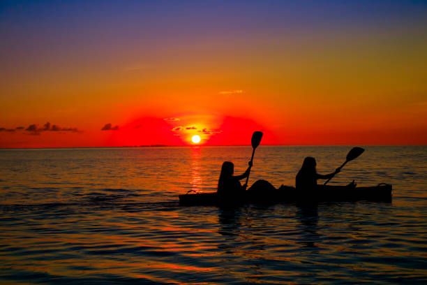 istock Woman silhouette on water 824132780