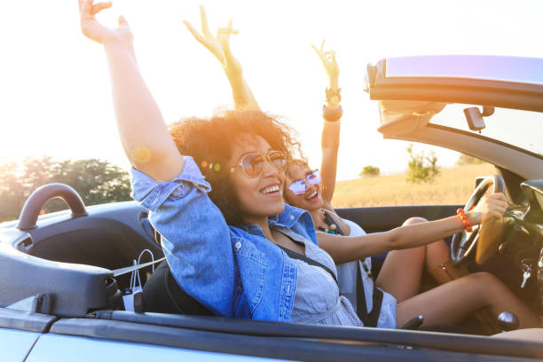 istock Girlfriends having fun on road trip 824133126