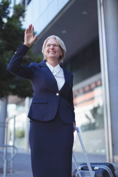 istock Smiling businesswoman gesturing 824133210