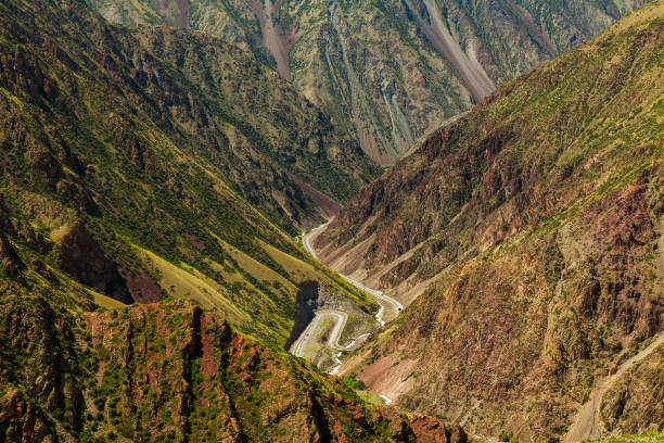 istock View from pass to green valley and the mountains 824136066