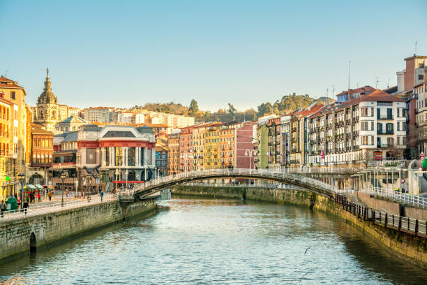 bilbao riverbank on sunny day, spain bilbao old town views comunidad autonoma del pais vasco stock pictures, royalty-free photos & images