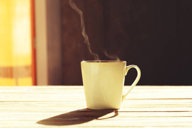 istock Cup of hot steaming coffee 824163632