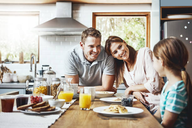 istock Is the little princess enjoying her breakfast? 824163868