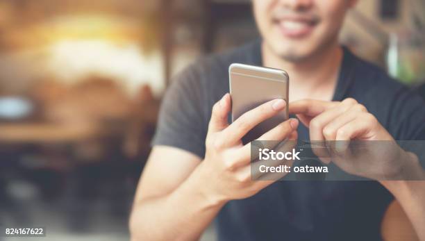 Happy Man Using Smartphone And Copy Space Stock Photo - Download Image Now - Mobile Phone, Telephone, Men