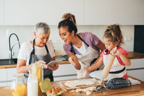 istock Family making cookies in the kitchen 824173710
