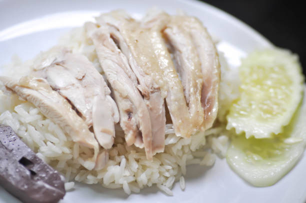 istock Hainanese chicken rice or rice topped with chicken 824175670