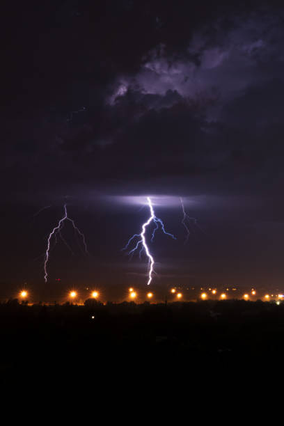 istock Bright flashes of lightning in dark sky 824175796