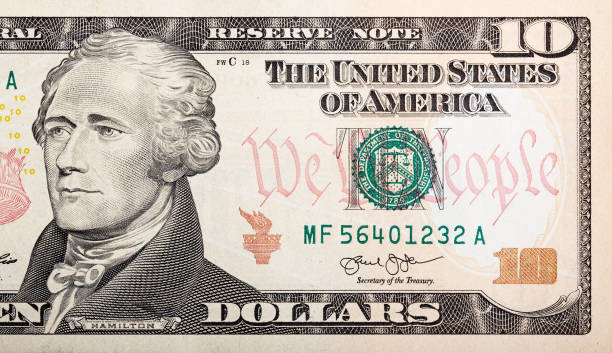 Part of ten dollar bill American money Part of ten dollar bill American money. High resolution photo. hamilton on stock pictures, royalty-free photos & images