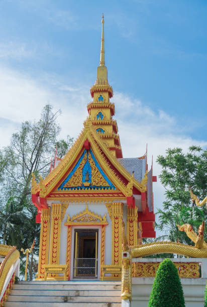istock Old golden church  and blue sky. 824178516