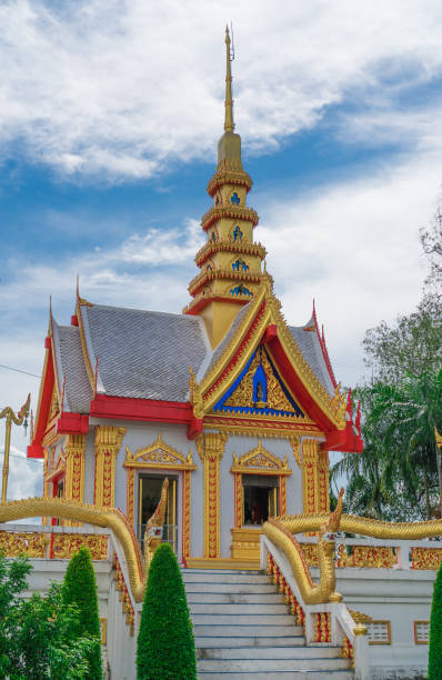 istock Old golden church  and blue sky. 824179156