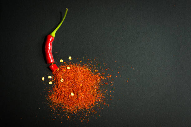 istock Red chili pepper and chili flakes 824179230