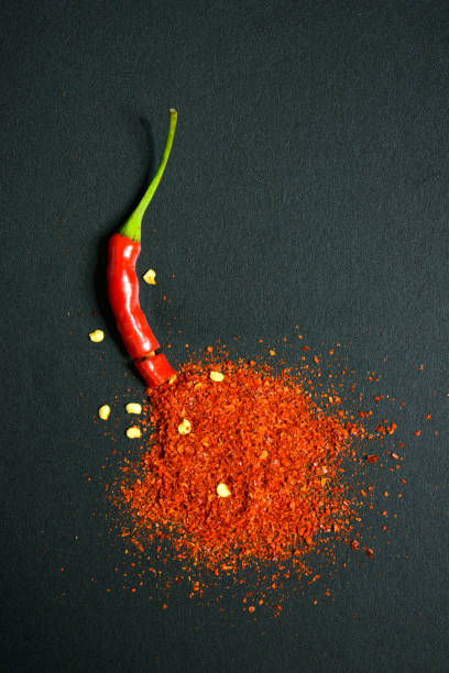 istock Red chili pepper and chili flakes 824179510
