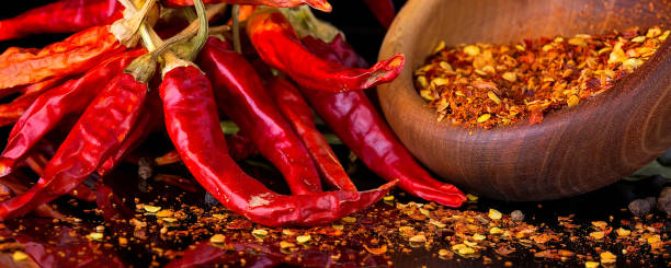 istock Chili peppers on a black background 824181942