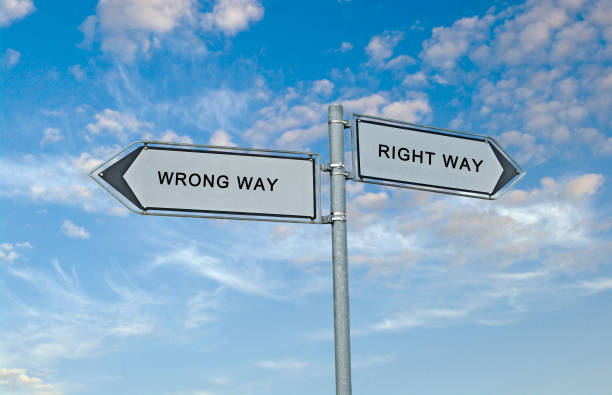 istock Road signs to right and wrong ways 824185392