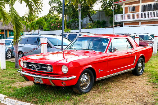 Acapulco, Mexico - May 28, 2017: Retro sports car Ford Mustang in the city street.