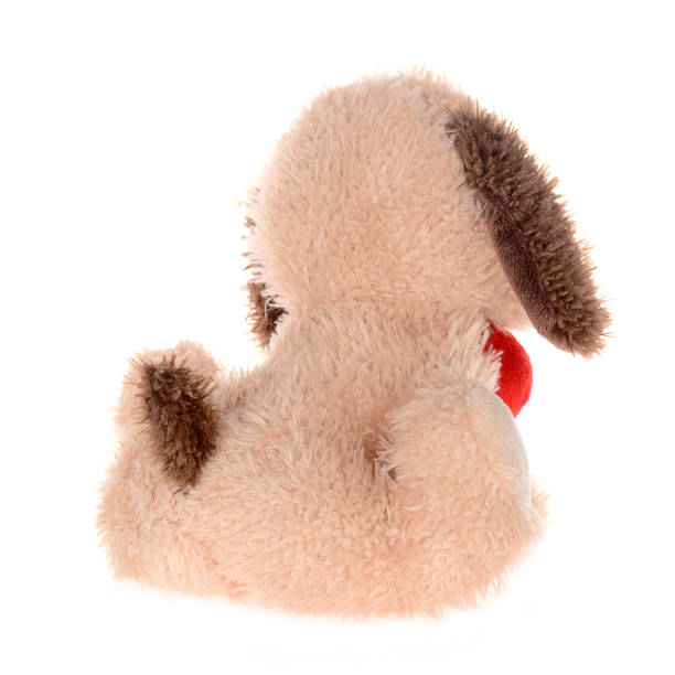 istock Toy fluff dog with heart 824190324