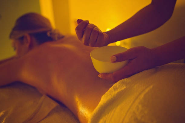 istock Young female enjoying a body massage 824194060