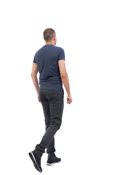 Back view of going  handsome man. Back view of going  handsome man. walking young guy . Rear view people collection.  backside view of person.  Isolated over white background. alternative pose photos stock pictures, royalty-free photos & images