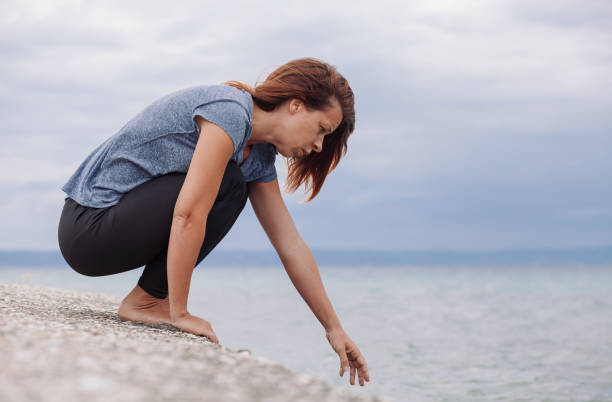 istock Woman alone and depressed on the bridge 824208662
