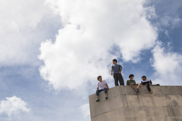istock Young people playing with friends to enjoy Parkour 824213708